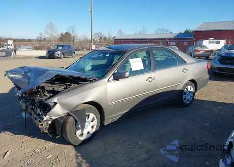 2003 Toyota Camry Le from USA, damaged, VIN 4T1BE32K33U741780